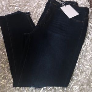 Dark blue distressed skinny jeans